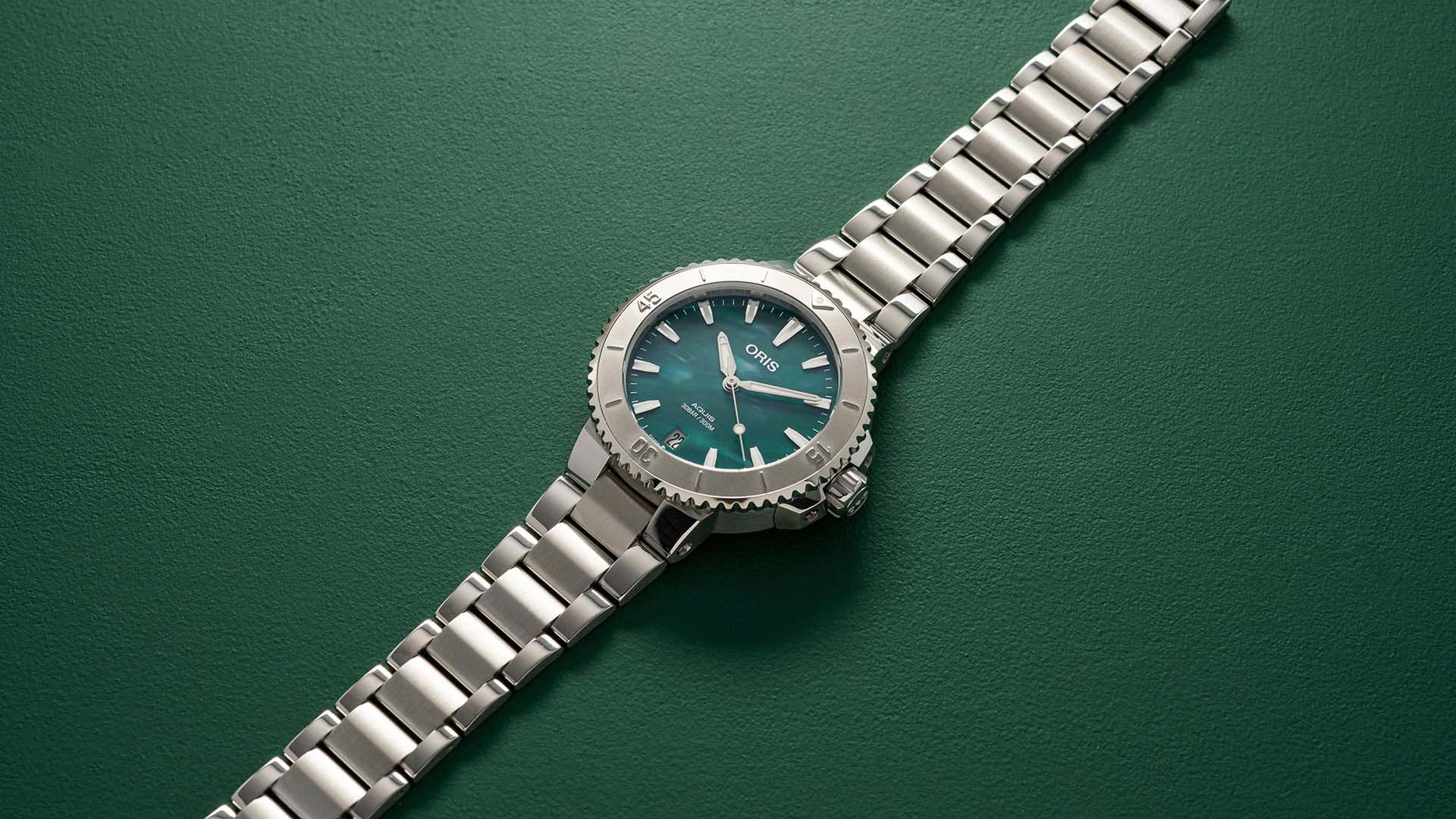 Oris Oris Aquis Oris X Bracenet 01 733 7770 4137-07 8 18 05P, aquis швейцария женские часы на браслете нержавеющая сталь боковой вид